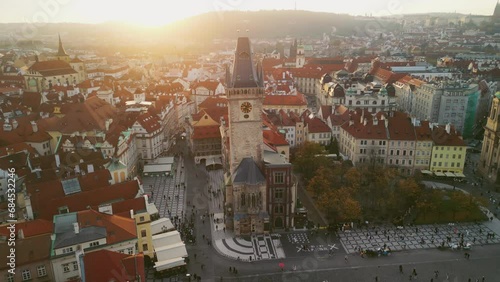 Aerial drone shot of Old Town Square in the historic center of Prague, the capital of the Czech Republic. Beauty of the famous Gothic landmarks. Drone Shoot. Sunset photo