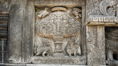 Stone relief on the wall of Prambanan Temple. A Hindu temple located in Yogyakarta, Indonesia