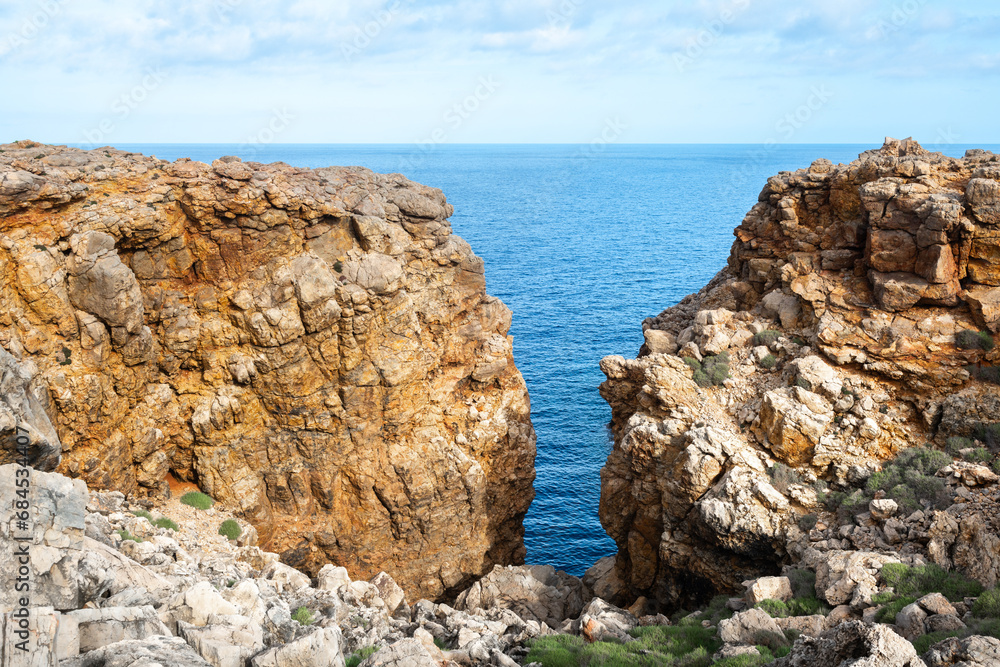 Rocky coast of Punta Nati in Menorca island, Spain