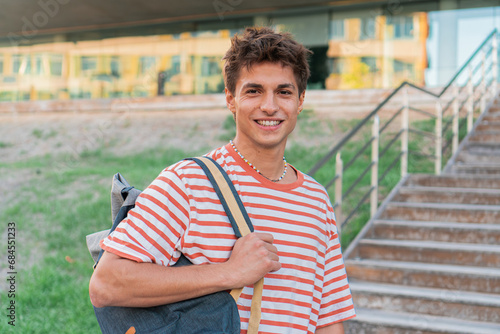 Quadro su tela Confident youngster student smile looking at camera outside the university campus