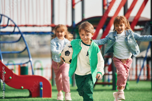 On the playground. Kids are having fun together © standret