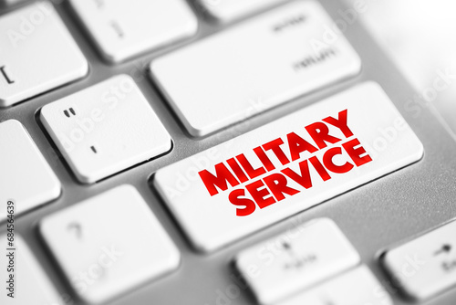 Military Service is service by an individual or group in an army, air forces, and naval forces, text concept button on keyboard