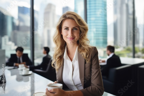 Portrait of business woman executive director in skyscraper financial district