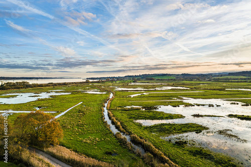 Wetlands and Marshes in RSPB Exminster and Powderham Marshe from a drone, Exeter, Devon, England