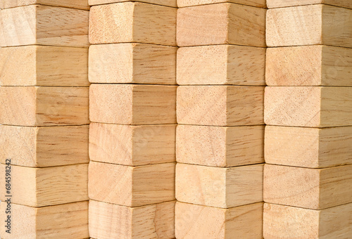 Billede på lærred Block of woods. Background of beautifully stacked wooden planks.