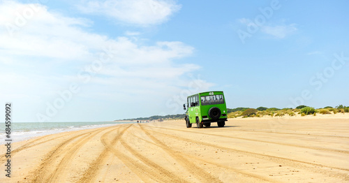 Guided tourist tour in a 4x4 off-road vehicle to the Doñana National Park, Andalusia, southern Spain photo