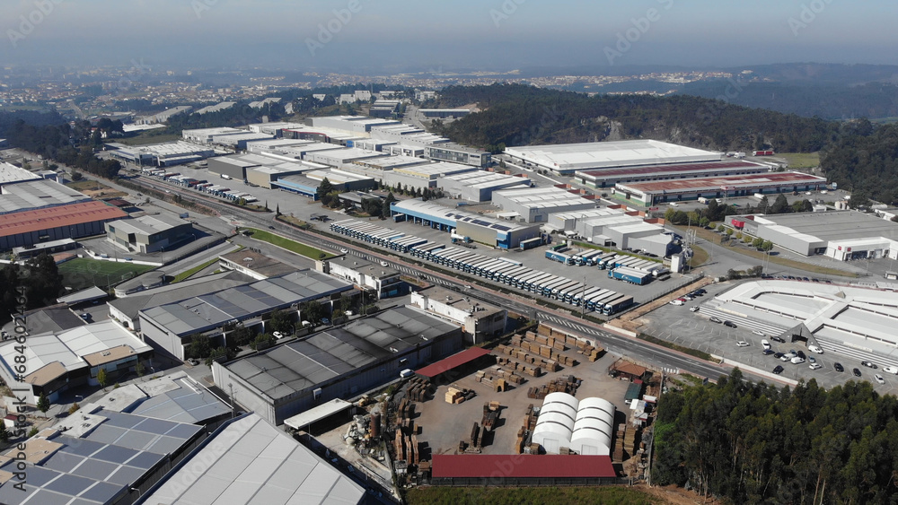 Ribeirao, Portugal, August 4, 2021: Aerial view of the SAM Business Park, located south of Famalicao county, this business park is served by the N14. The Supply Market.