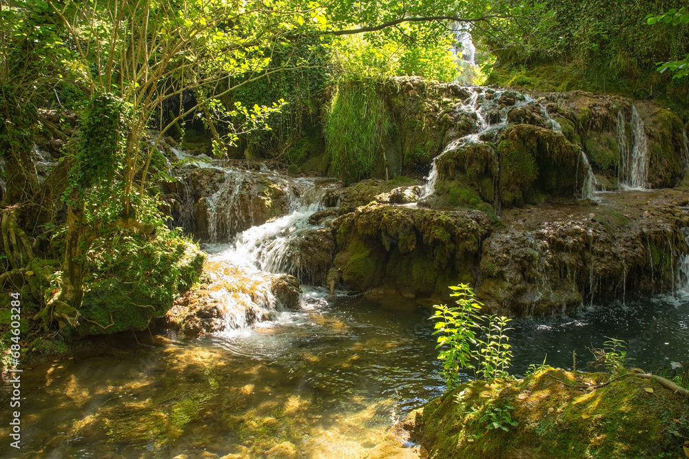 The River Una below Milancev Buk waterfall at Martin Brod in Una-Sana Canton, Federation of Bosnia and Herzegovina. Located in Una National Park, it is also known as Veliki Buk or Martinbrodski The River Una below Milancev Buk waterfall at Martin Brod in Una-Sana Canton, Federation of Bosnia and Herzegovina. Located in Una National Park, it is also known as Veliki Buk or Martinbrodski