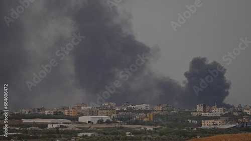 War in Gaza Artillery smoke over the city
