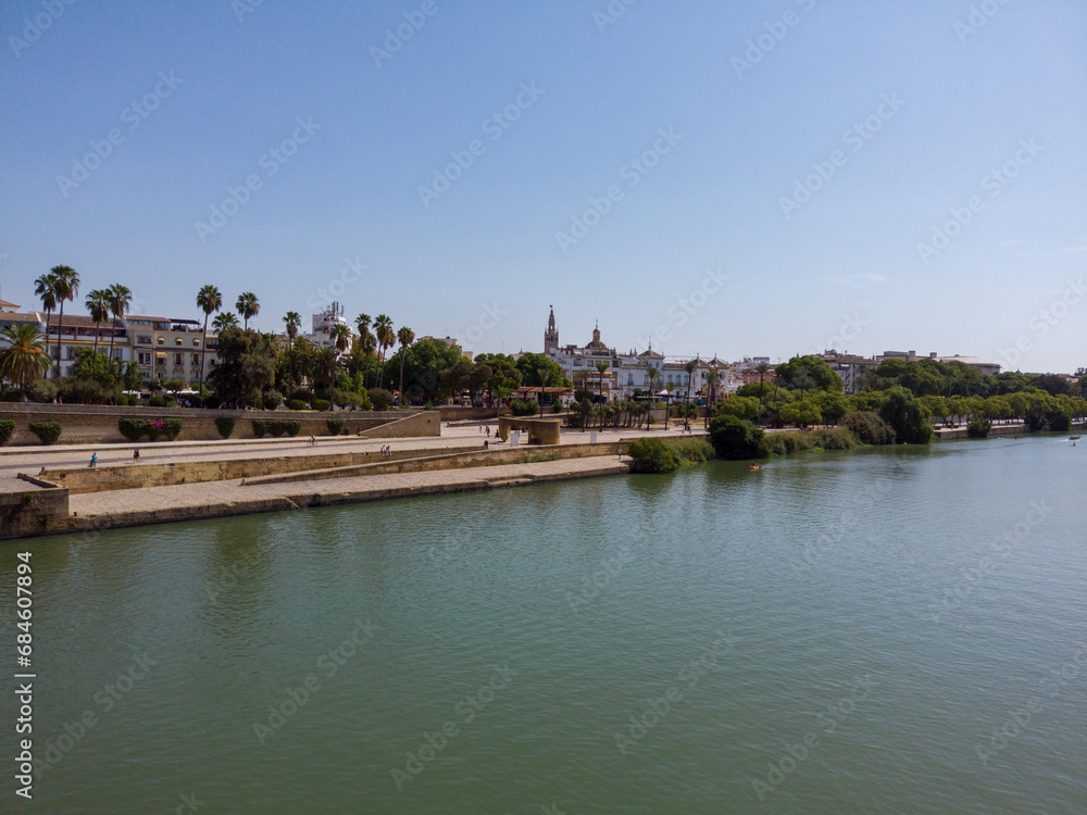 View of the waterfront of the Guadalquivir River in Seville, Andalusia, Spain. View of the waterfront of the Guadalquivir River in Seville, Andalusia, Spain.