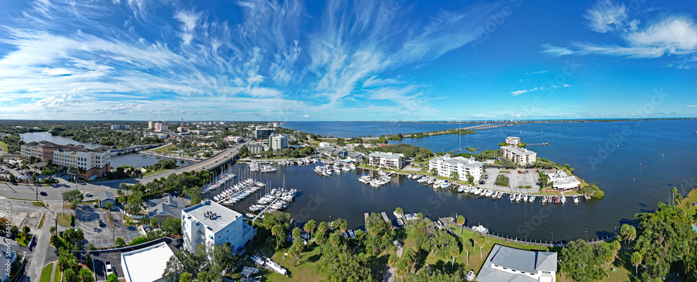 Obraz premium Aerial view of the Indian River, yacht harbor, and historic downtown Melbourne along Florida's Space Coast in Brevard County