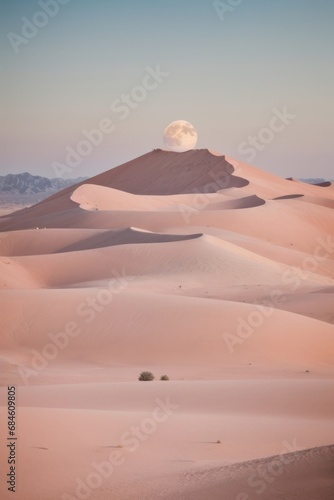 The moon is in a sandy pink desert. Landscape, beautiful nature, empty space for advertising.