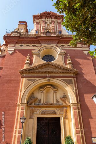 Seville, Spain, September 12, 2021: The façade of the Church of San Jacinto is located right in the Triana district, where the Calle Pagés del Corro and Calle San Jacinto come together.