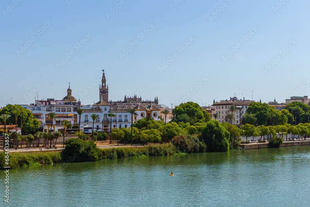 View of the waterfront of the Guadalquivir River in Seville, Andalusia, Spain.