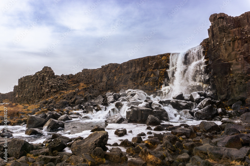 Oxararfoss waterfall in Thingvellir golden circle in autumn