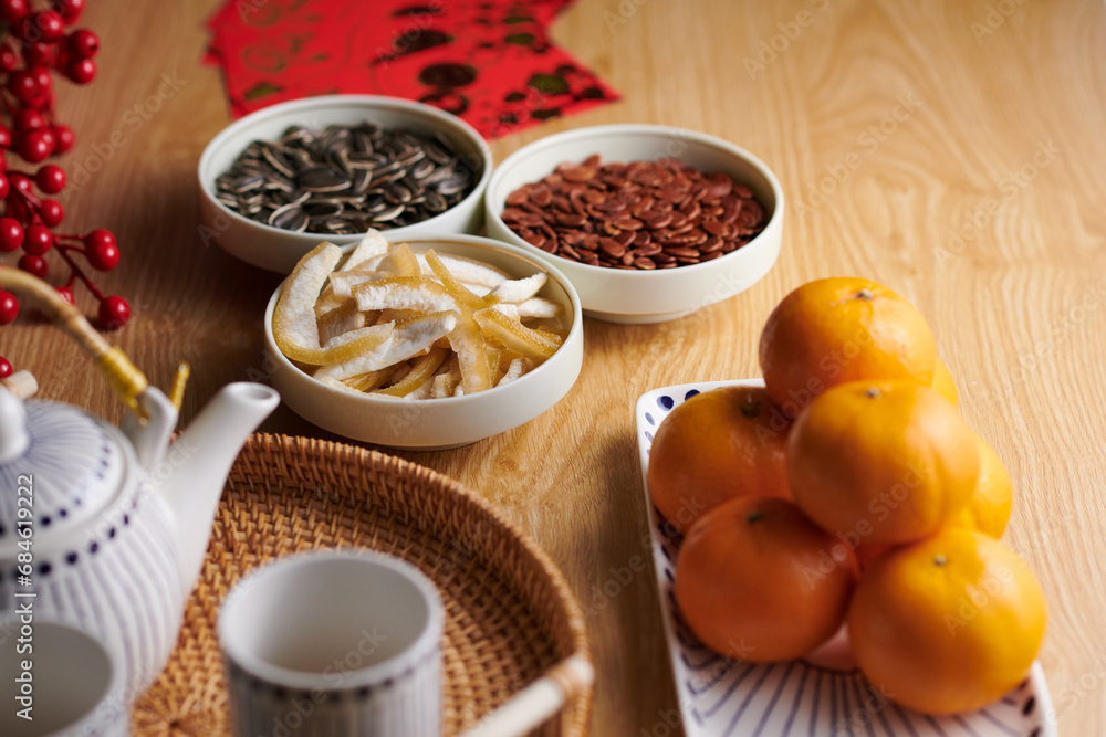 Small bowls with seeds and candied fruits prepared as treats to have with tea Small bowls with seeds and candied fruits prepared as treats to have with tea