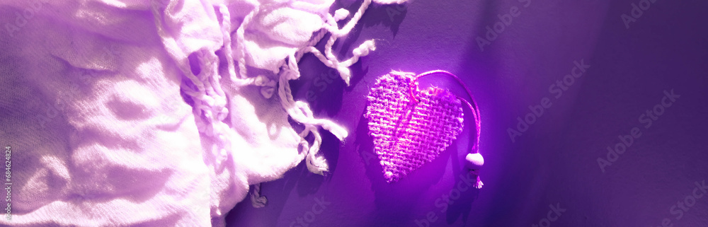 Valentines day or wedding greeting card, purple pink heart and  soft blanket background, love and wedding  concept. Copy space, banner