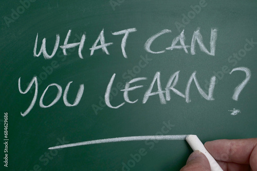 What can you learn text on chalkboard, business education