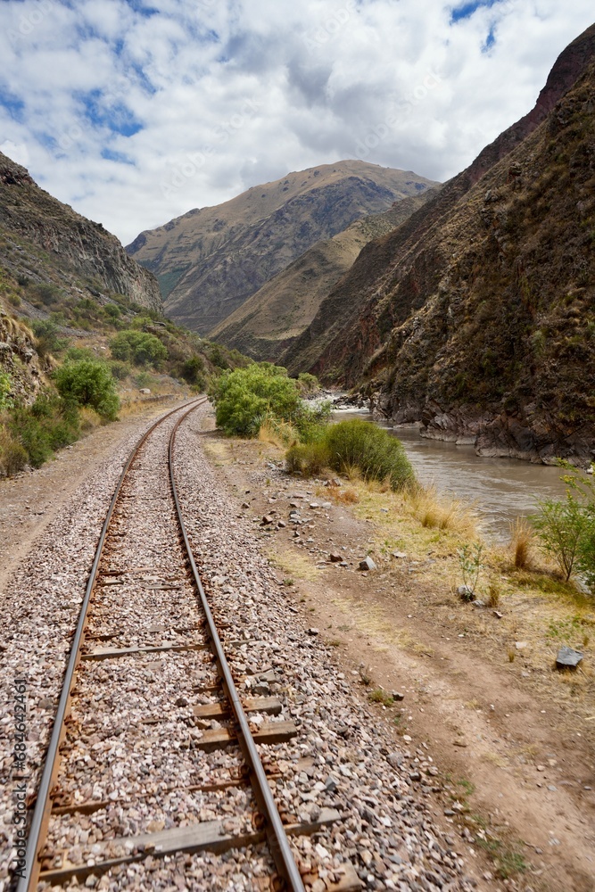 Train tracks through the Andes from Cusco to Puno. Cusco, Peru, October 8, 2023. Train tracks through the Andes from Cusco to Puno. Cusco, Peru, October 8, 2023.