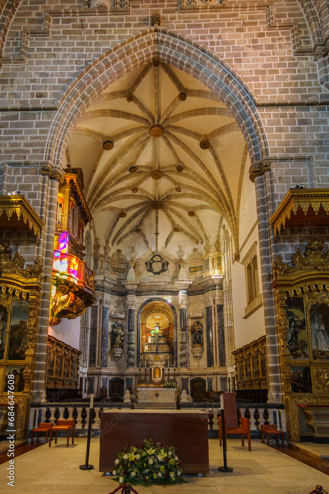 Altar inside of Saint Francis church Igreja de Sao Francisco and monastery or in Evora, Alentejo, Portugal