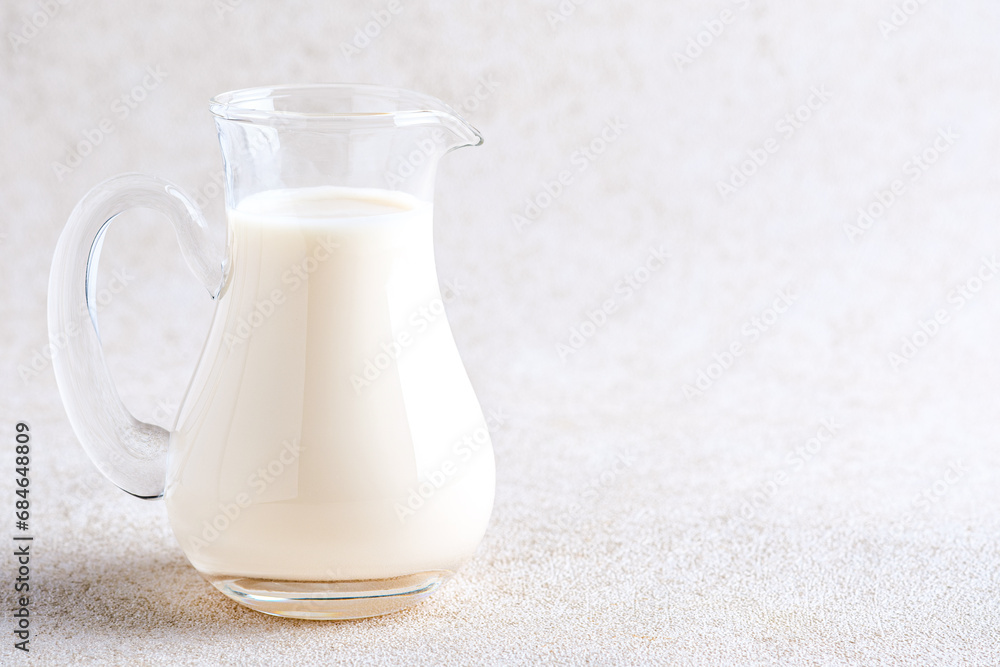 Fresh Milk in a Pitcher on a White Backgrounds. Fresh Milk in a Pitcher on a White Backgrounds.