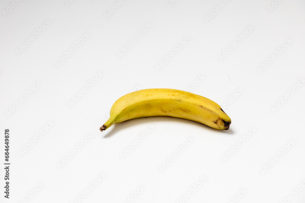 Whole yellow banana isolated on white background. Whole yellow banana isolated on white background.