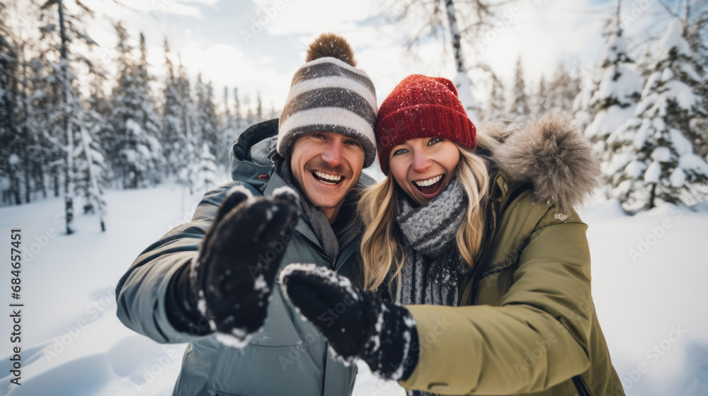 Playful couple having fun in winter scenery Playful couple having fun in winter scenery