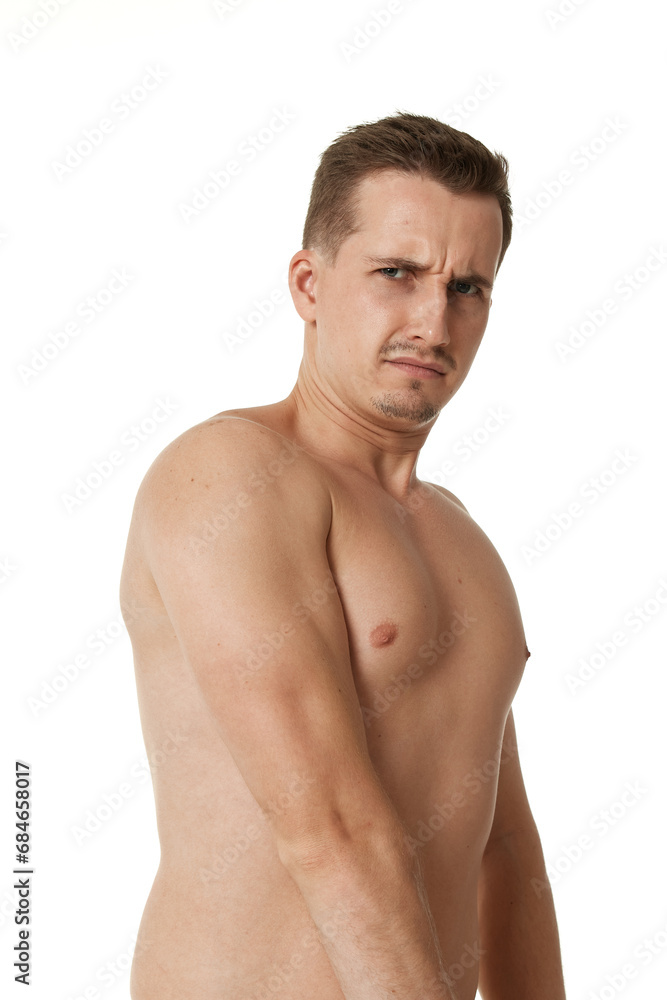 young man showing his bicep over white background young man showing his bicep over white background