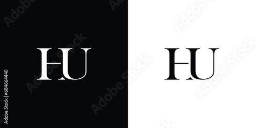Abstract UH or HU Abstract letters Logo monogram in black and white color photo