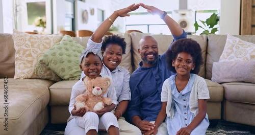 Insurance, security and a black family in the living room of a home together to protect their future. Portrait, safety or cover with a mother, father and children sitting under a roof on the floor photo