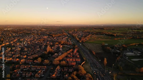 Generic aerial view of the town of Haydock in England with a dual carriageway at dusk photo