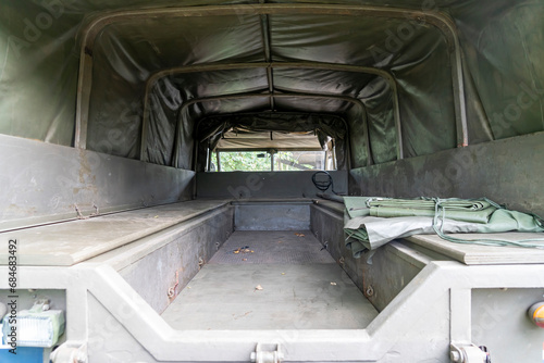 The interior of an old Dutch army truck that was previously used for passenger transport