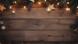 Christmas background with fir branches on wooden planks.