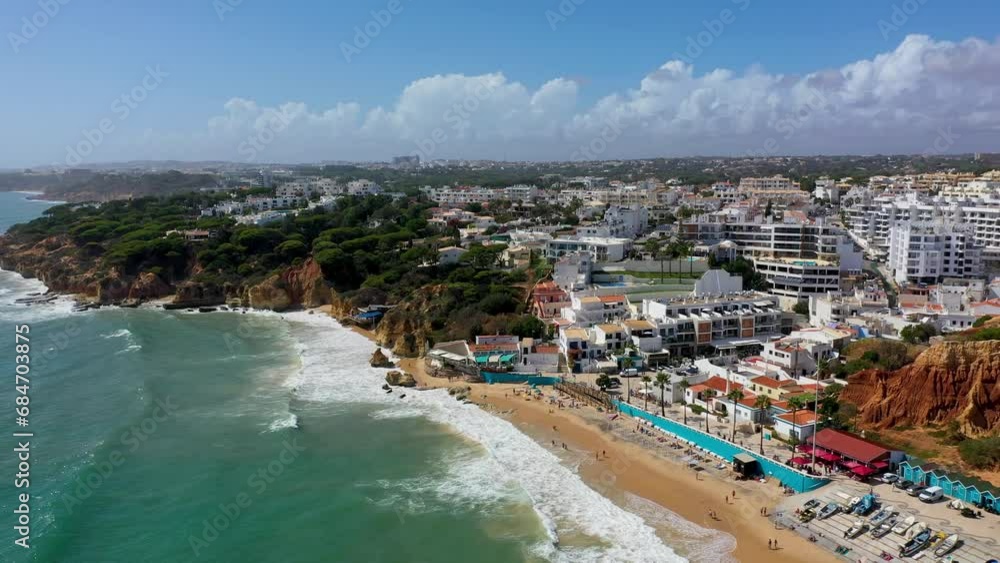 Amazing view from the sky of town Olhos de Agua in Albufeira, Algarve, Portugal. Aerial coastal view of town Olhos de Agua, Albufeira area, Algarve, Portugal. Amazing view from the sky of town Olhos de Agua in Albufeira, Algarve, Portugal. Aerial coastal view of town Olhos de Agua, Albufeira area, Algarve, Portugal.