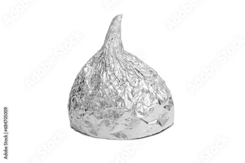 Aluminium foil hat isolated on white background, symbol for conspiracy theory and mind control protection. Top view. photo