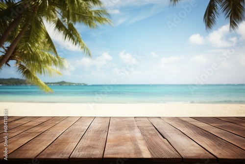 Empty wooden table with tropical beach theme in background © Muhammad