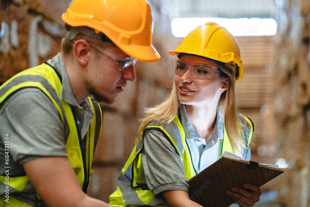 Female engineer using laptop computer for safety control checks or manufacturing maintenance work in factory building or construction site. woman engineer inspector working in industry product line Female engineer using laptop computer for safety control checks or manufacturing maintenance work in factory building or construction site. woman engineer inspector working in industry product line