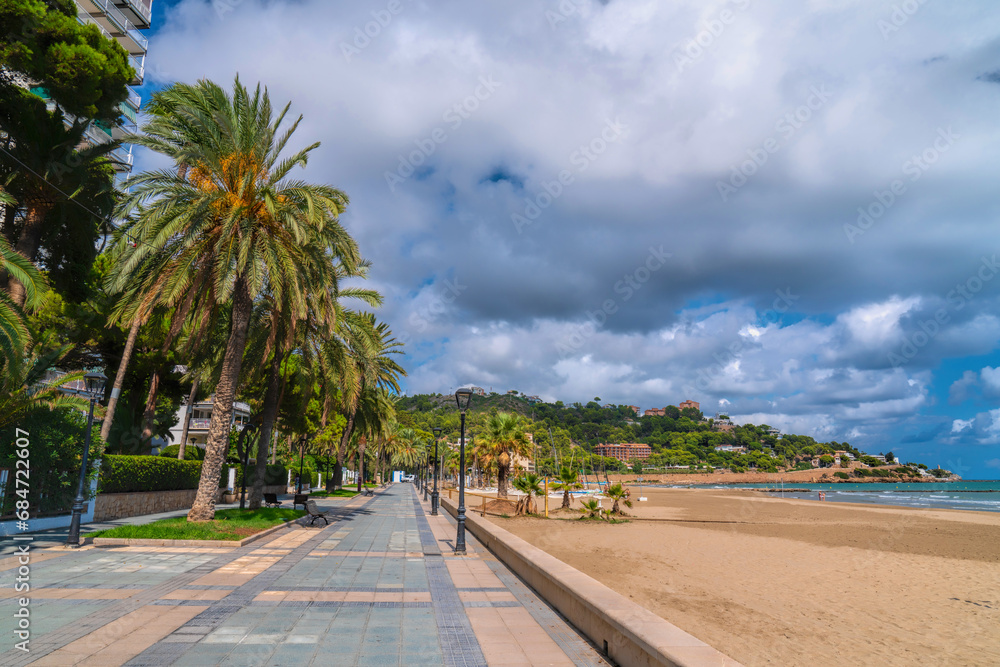 Benicassim promenade with palm trees Spain Playa Voramar spanish tourist destination