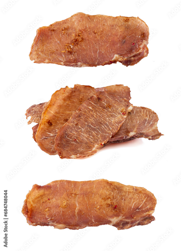 Pieces of cured pork isolated on white background. Portion of dried pork on white background. Dried pork isolated on white background. Pieces of dry meat. Pieces of cured pork isolated on white background. Portion of dried pork on white background. Dried pork isolated on white background. Pieces of dry meat.