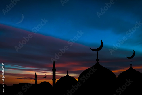 Mosques Dome on dark blue twilight sky and Crescent Moon on background, symbol islamic religion Ramadan and free space for text arabic, Eid al-Adha, Eid al-fitr, Mubarak, Islamic new year Muharram 