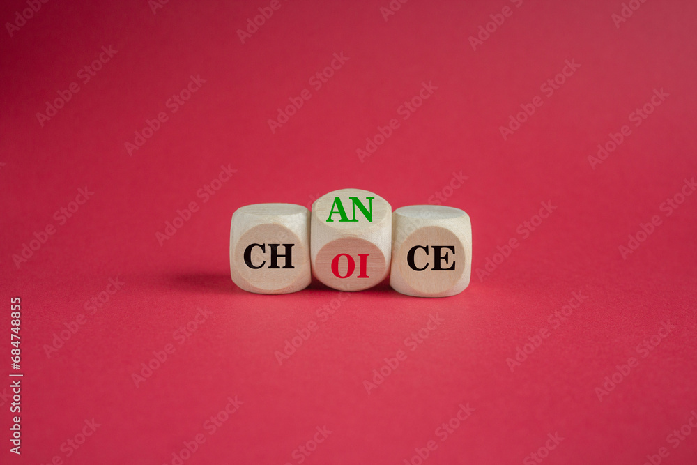 Turned the wooden cube and changes the red word choice to chance. Beautiful red background, copy space. Business and choice and chance concept. Turned the wooden cube and changes the red word choice to chance. Beautiful red background, copy space. Business and choice and chance concept.