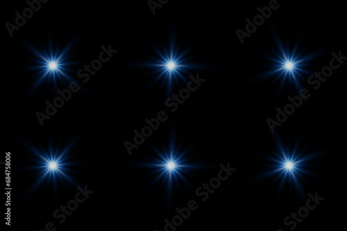 Fototapeta Naklejka Na Ścianę i Meble -  Set of highlights. Flashes of rays of light. The effect of glow, radiance, shine. Collection of various glowing sparks, stars. On a black background.