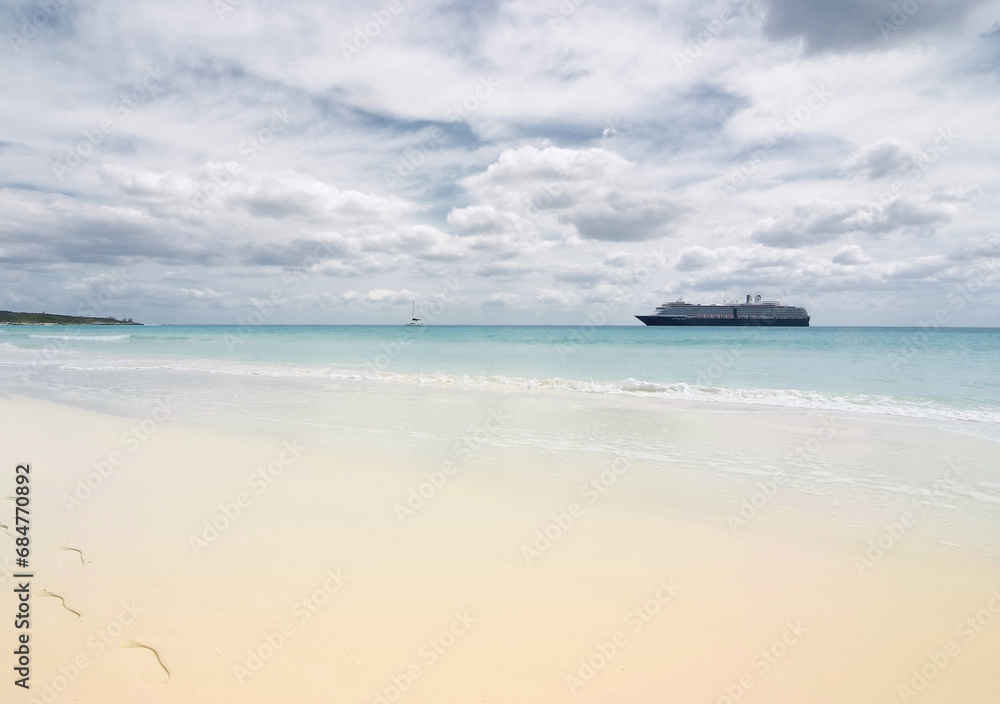 Anchored Vessel on Idyllic Beach Anchored Vessel on Idyllic Beach