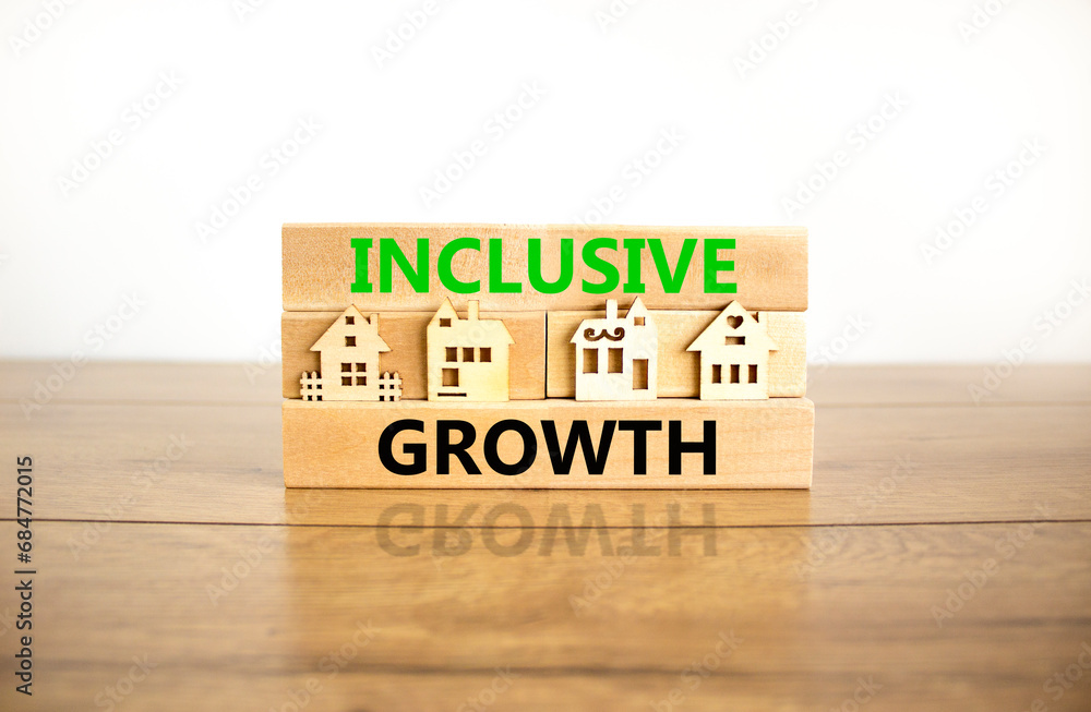 Inclusive growth symbol. Concept words Inclusive growth on beautiful wooden blocks. Beautiful wooden table white background. House model. Business inclusive growth concept. Copy space. Inclusive growth symbol. Concept words Inclusive growth on beautiful wooden blocks. Beautiful wooden table white background. House model. Business inclusive growth concept. Copy space.