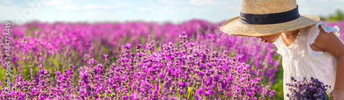 Child in a lavender field. Selective focus.