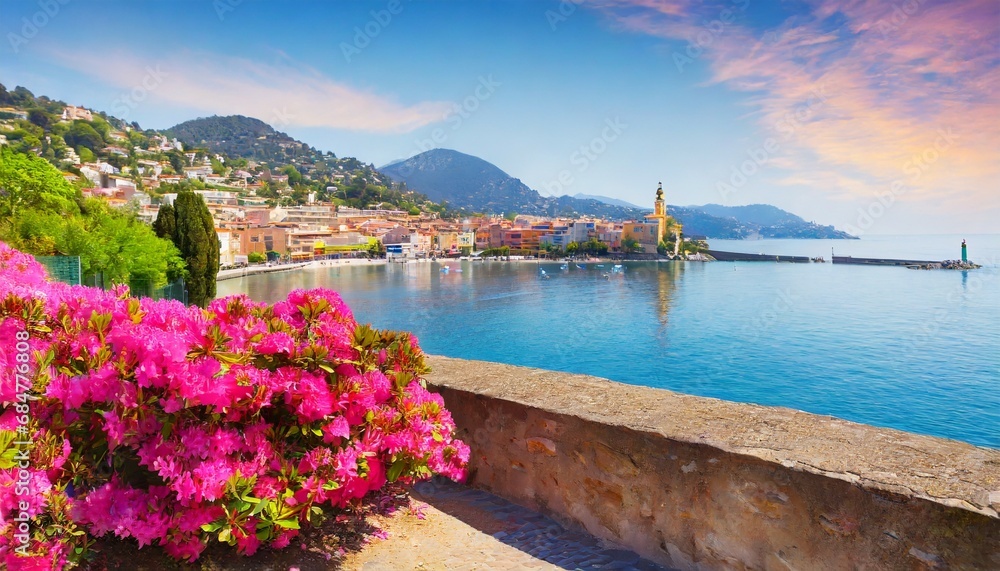 seafront landscape with azalea flowers french reviera view of stunning picturesque coastal town