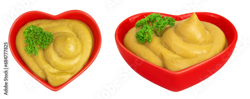Mustard sauce in ceramic bowl with seed isolated on white background. Top view. Flat lay