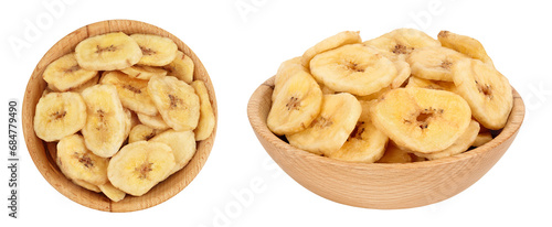 Dried banana chips in wooden bowl isolated on white background with full depth of field. Top view. Flat lay
