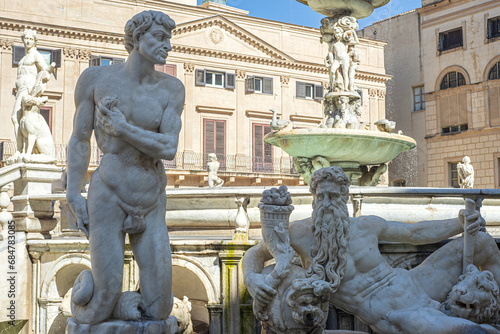 In the heart of Palermo's loveliest square, Piazza Pretoria, stands this magnificent fountain, Fontana Pretoria, work of the Florentine sculptor Francesco Camilliani. Palermo, Sicily, Italy. photo