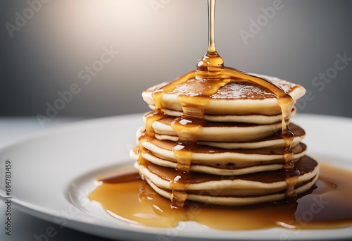 Stack of pancake with honey syrup on the white plate on isolated transparent background